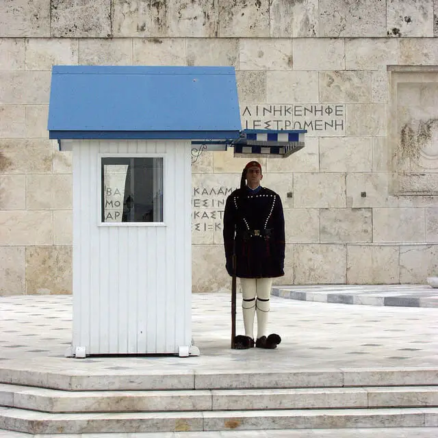 Guarding the tomb of the unknown solder, at the Greek Paliament Square.
